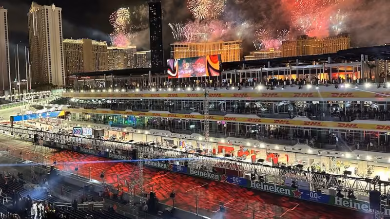 Fireworks over the Las Vegas Grand Prix pit building and Strip skyline