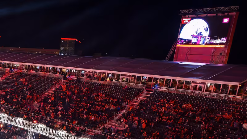 Packed grandstands and a big screen at the Las Vegas Grand Prix on race night