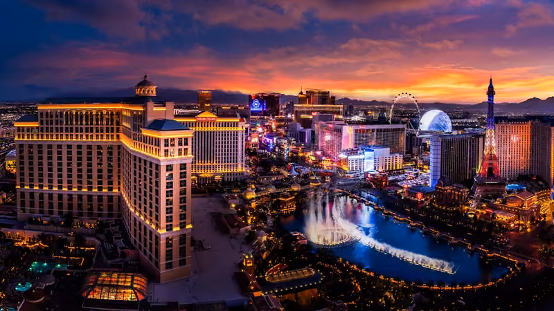 Las Vegas Strip at sunset with the Bellagio Fountains, High Roller, and Eiffel Tower